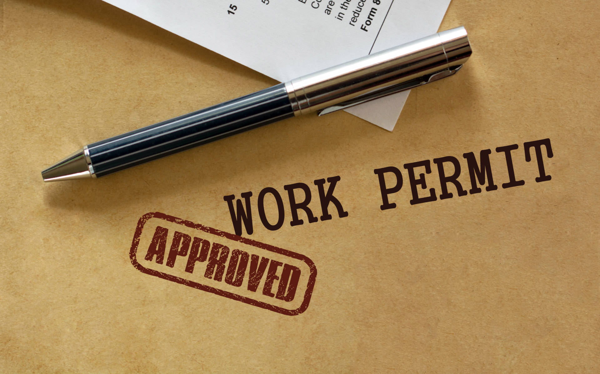 Approved work permit.