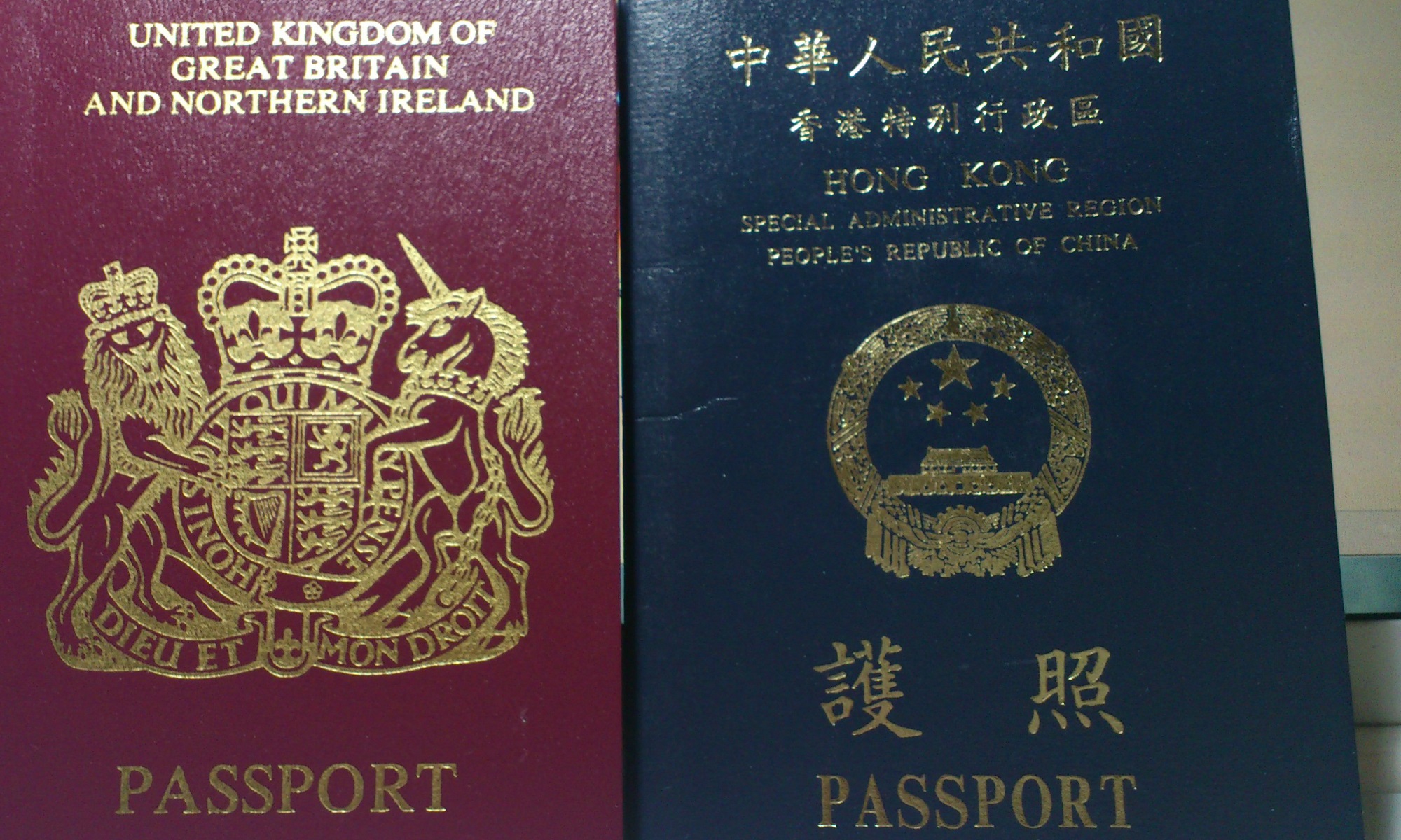 Hong Kong and British passports.