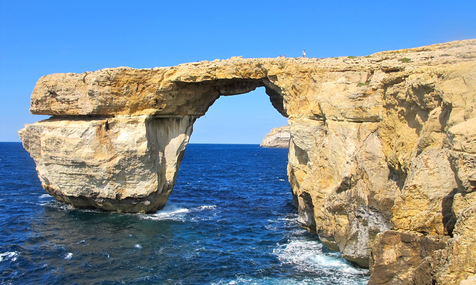 Arch cliff in the sea.